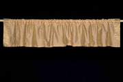 Golden rod sari valance mounted above a window