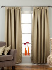 Olive green sari tab top curtains hung at a window