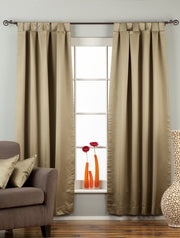 Olive green sari tab top curtains hung at a window