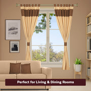 Brown raw silk curtain and cushion cover set shown together