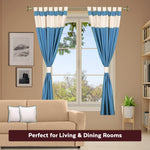Turquoise raw silk curtain and cushion cover set shown together