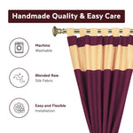 Maroon raw silk curtain and cushion cover set shown together