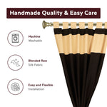 Black raw silk curtain and cushion cover set shown together