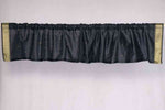 Black sari valance mounted above a window