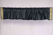 Black sari valance mounted above a window