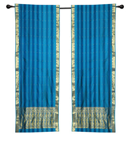 Blue sari rod pocket curtains hung at a window