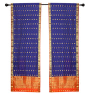 Blue sari rod pocket curtains hung at a window