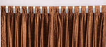 Brown velvet tab top curtains hung at a window