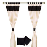 Cream raw silk curtain and cushion cover set shown together