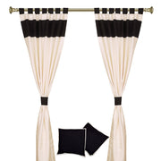 Cream raw silk curtain and cushion cover set shown together