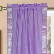 Lavender sari rod pocket curtains hung at a window