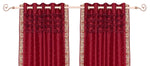 Fire brick sari grommet top curtains hung at a window