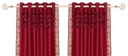 Fire brick sari grommet top curtains hung at a window