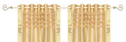 Golden sari grommet top curtains hung at a window