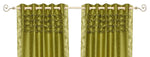 Olive green sari grommet top curtains hung at a window