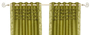 Olive green sari grommet top curtains hung at a window