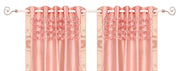 Peach sari grommet top curtains hung at a window