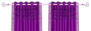 Violet sari grommet top curtains hung at a window