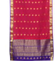 Sari rod pocket curtains hung at a window