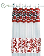 Maroon sheer tissue ring top curtains hung at a window