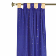 Blue sari tab top curtains hung at a window