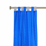 Coral sari tab top curtains hung at a window