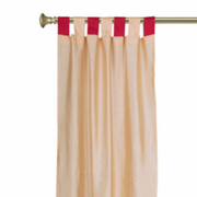 Gold sari tab top curtains hung at a window