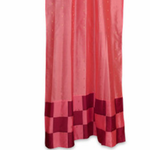 Peach sari tab top curtains hung at a window