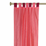 Peach sari tab top curtains hung at a window