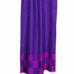 Lavender sari tab top curtains hung at a window