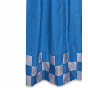 Turquoise sari tab top curtains hung at a window