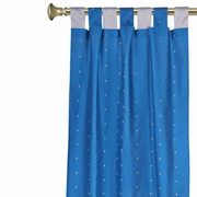Turquoise sari tab top curtains hung at a window