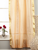 Misty rose sari tab top curtains hung at a window