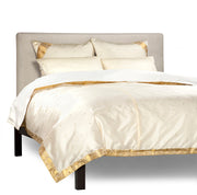 Cream sari duvet cover set made up on a bed