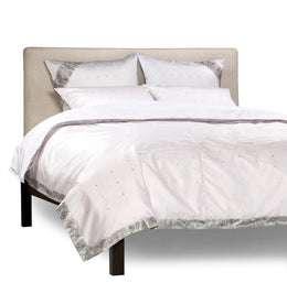 Silver sari duvet cover set made up on a bed