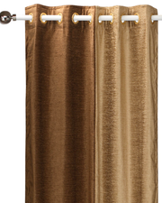 Taupe velvet ring top curtains hung at a window