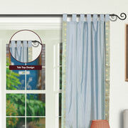 Gray sari tab top curtains hung at a window