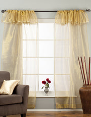 Golden rod sheer tissue rod pocket curtains hung at a window