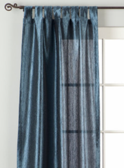 Navy blue sari tab top curtains hung at a window