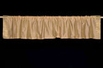 Golden rod sari valance mounted above a window