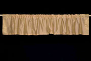 Golden rod sari valance mounted above a window