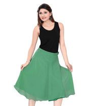 Green georgette pleated skirt shown draped on a model