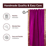 Violet sari rod pocket curtains hung at a window