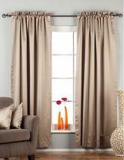 Gray sari rod pocket curtains hung at a window
