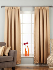 Taupe sari tab top curtains hung at a window