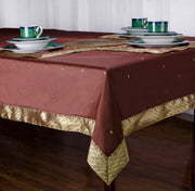 Sophisticated brown sari tablecloth laid on a dining table
