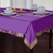 Calming lavender sari tablecloth laid on a dining table