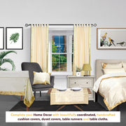 Cream sari tab top curtains hung at a window