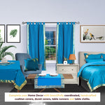 Turquoise sari tab top curtains hung at a window