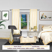 Cream sari rod pocket curtains hung at a window